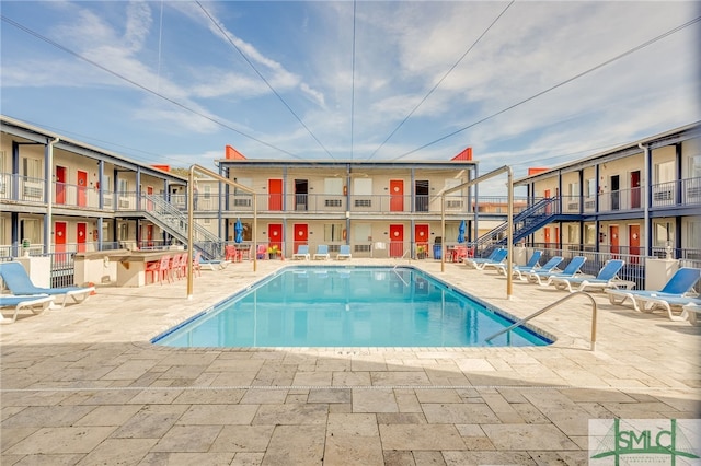 16 Tybrisa St Unit 127, Tybee Island, GA 31328 - community pool featuring a patio area and stairs