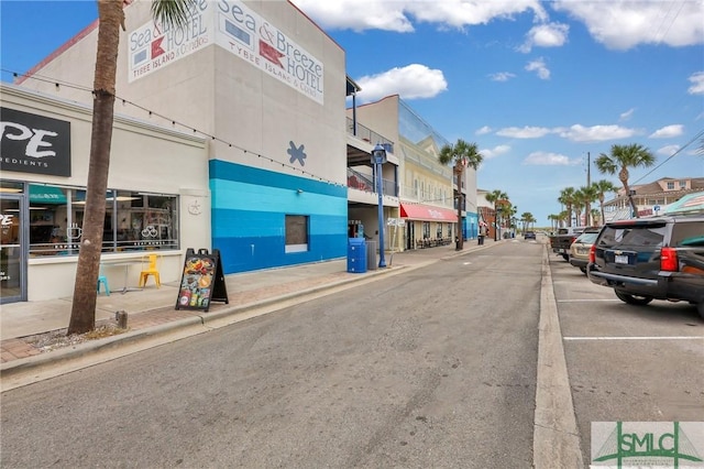 16 Tybrisa St Unit 127, Tybee Island, GA 31328 - view of asphalt street with sidewalks, street lighting, and curbs
