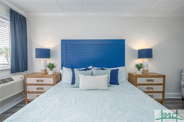 16 Tybrisa St Unit 127, Tybee Island, GA 31328 - bedroom featuring ornamental molding and dark wood-type flooring