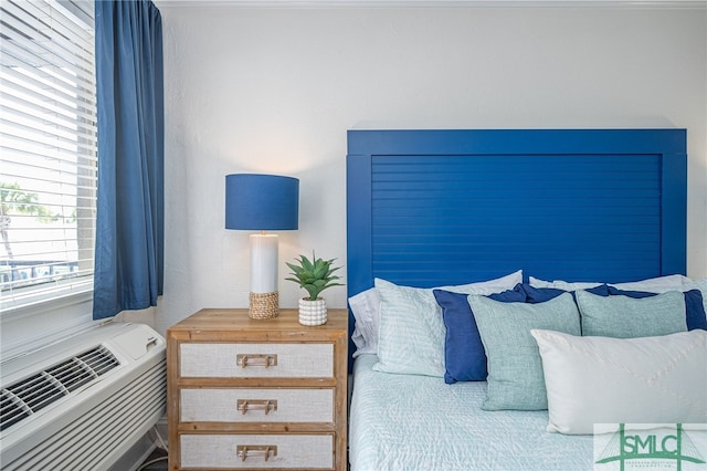 16 Tybrisa St Unit 127, Tybee Island, GA 31328 - bedroom with a wall mounted AC