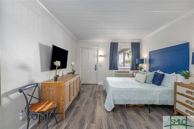 bedroom featuring cooling unit, dark wood-type flooring, and ornamental molding