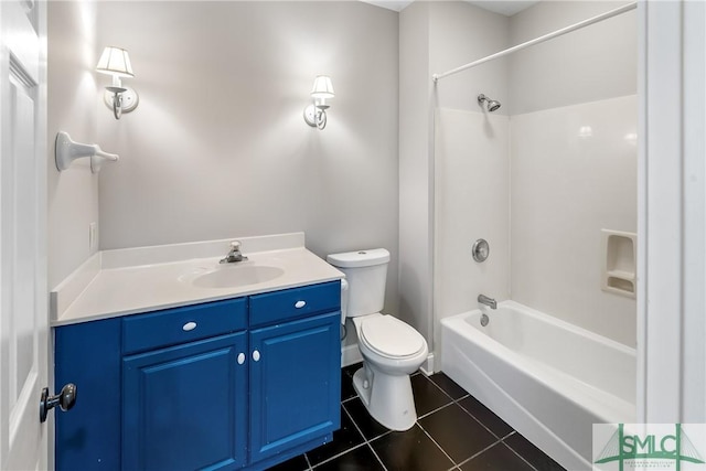 full bathroom featuring toilet, tile patterned flooring, shower / washtub combination, and vanity