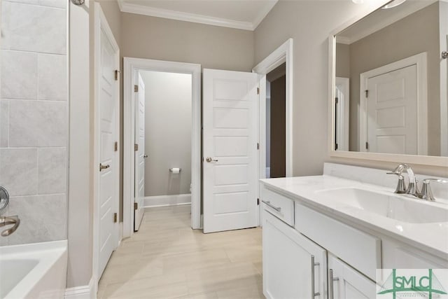 bathroom with tile patterned flooring, vanity, toilet, and ornamental molding