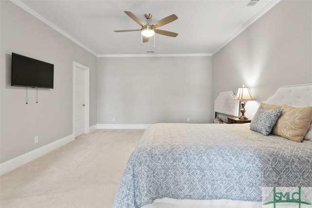 carpeted bedroom featuring ceiling fan and ornamental molding