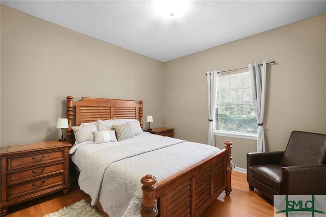 bedroom featuring light hardwood / wood-style flooring