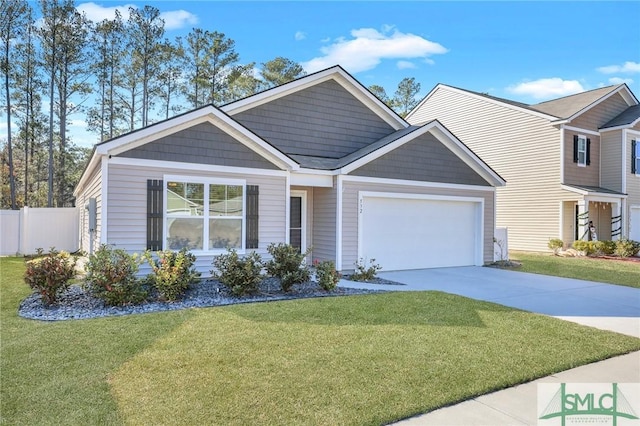 view of front facade featuring a garage and a front yard