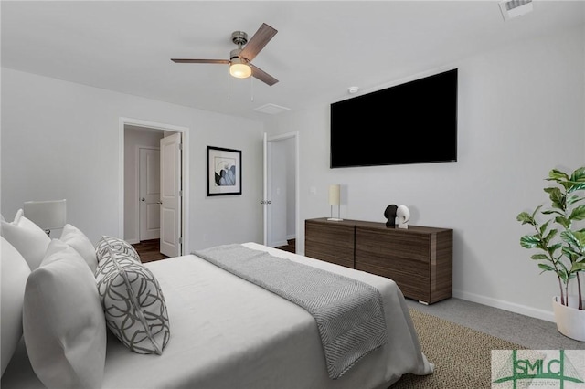 carpeted bedroom with ceiling fan