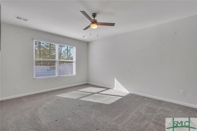 carpeted empty room with ceiling fan