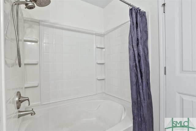 bathroom with shower / bath combination with curtain