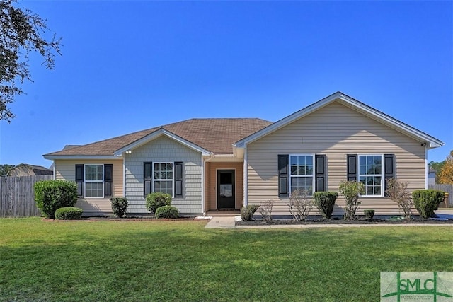 ranch-style home with a front lawn