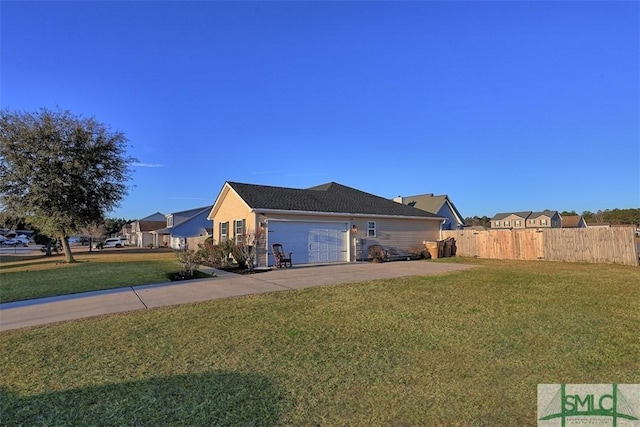 view of home's exterior featuring a yard and a garage