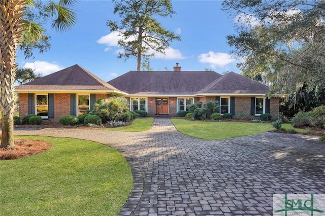 ranch-style house with a front yard