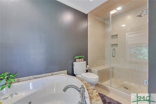 bathroom featuring separate shower and tub and toilet