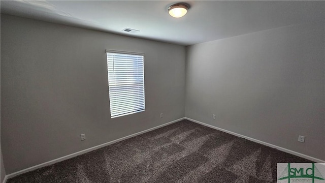 empty room with carpet floors