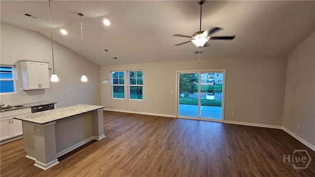 83 Marsh Salt Ln, Port Wentworth, GA 31407 - kitchen with dark wood-type flooring, a center island, vaulted ceiling, ceiling fan, and dishwashing machine