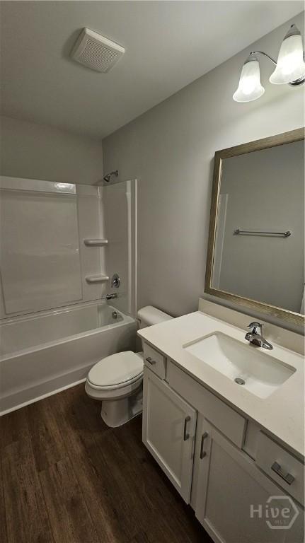 83 Marsh Salt Ln, Port Wentworth, GA 31407 - full bathroom featuring vanity, wood finished floors, and bathing tub / shower combination