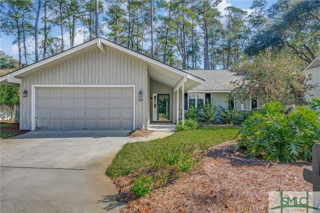 ranch-style home featuring a garage