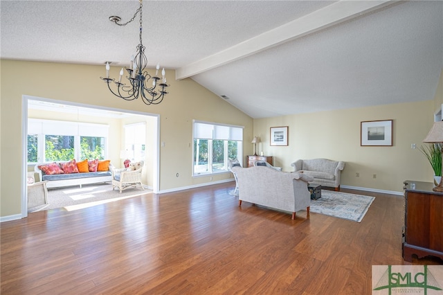 living room with vaulted ceiling with beams, dark hardwood / wood-style floors, plenty of natural light, and a chandelier