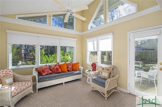 sunroom with plenty of natural light and ceiling fan