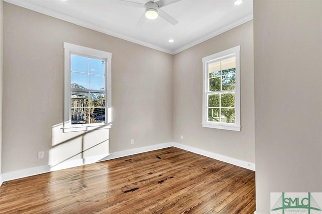 unfurnished room featuring ceiling fan, crown molding, and wood-type flooring