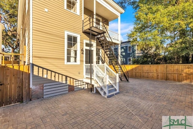 view of patio / terrace with a balcony