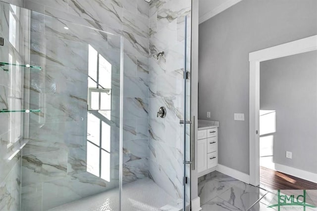 bathroom with vanity and a shower with shower door