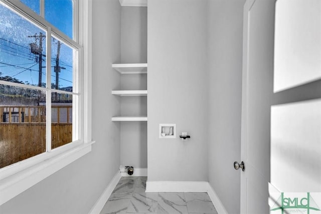 washroom with electric dryer hookup and hookup for a washing machine