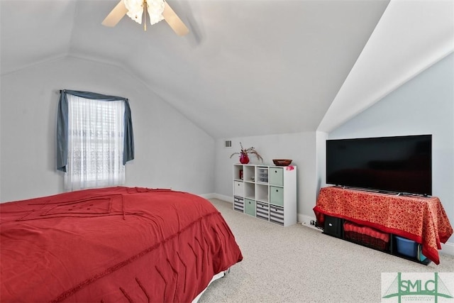 carpeted bedroom featuring ceiling fan and lofted ceiling