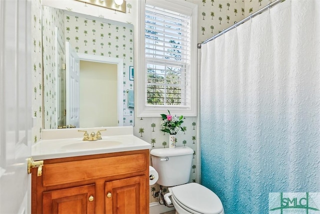 bathroom with vanity and toilet