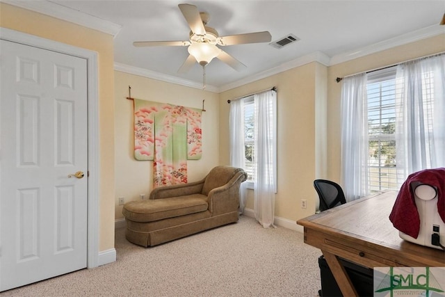 office area with light carpet, crown molding, and ceiling fan