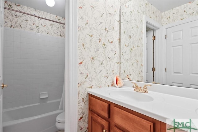 full bathroom with toilet, vanity, and shower / tub combo