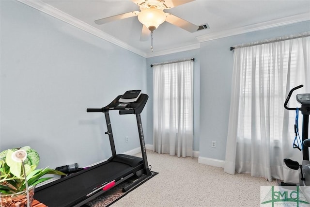 exercise room with ornamental molding and ceiling fan