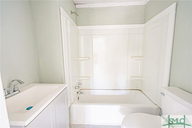 full bathroom with vanity,  shower combination, and toilet