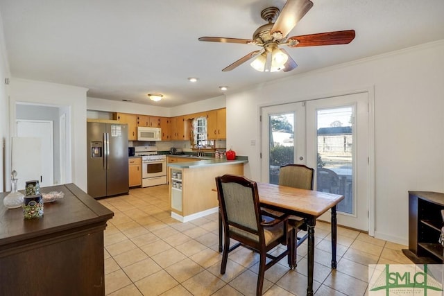 dining space featuring light tile patterned floors, baseboards, a ceiling fan, and french doors