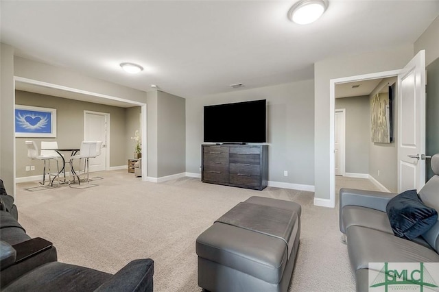 living room featuring light colored carpet