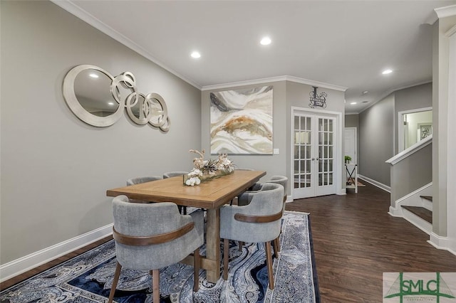 dining room with crown molding, french doors, and dark hardwood / wood-style floors