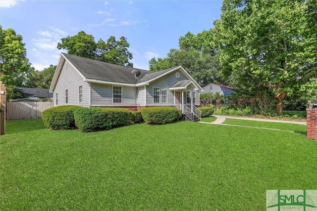 view of front of home with a front yard