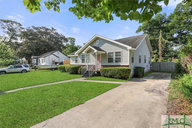 view of front of home with a front yard