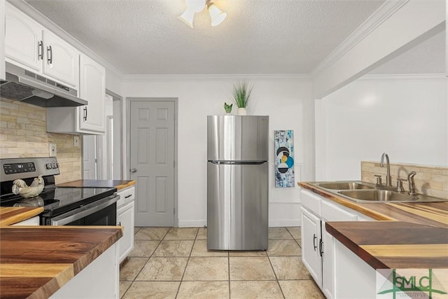 kitchen featuring sink, a textured ceiling, butcher block countertops, white cabinetry, and stainless steel appliances