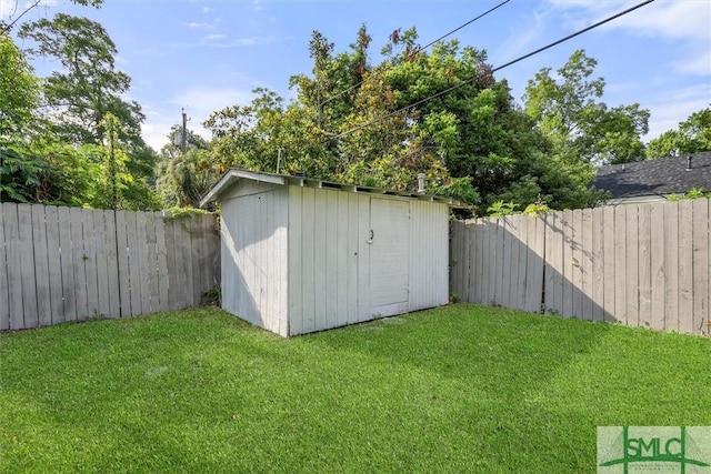 view of outbuilding with a lawn