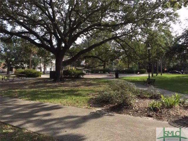 view of home's community featuring a yard