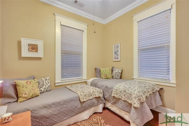 sitting room featuring ornamental molding