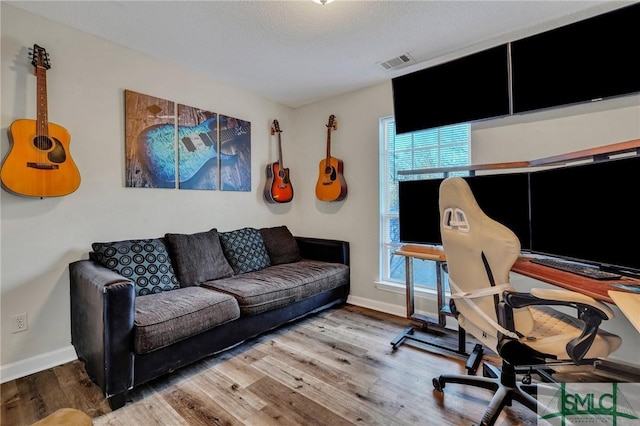 office area featuring hardwood / wood-style floors