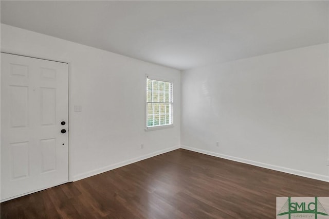 entrance foyer featuring dark hardwood / wood-style flooring