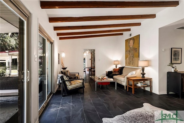 sitting room featuring lofted ceiling with beams