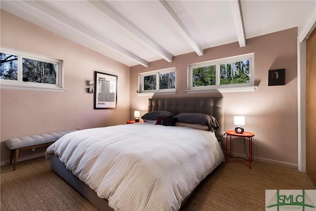 carpeted bedroom with lofted ceiling with beams