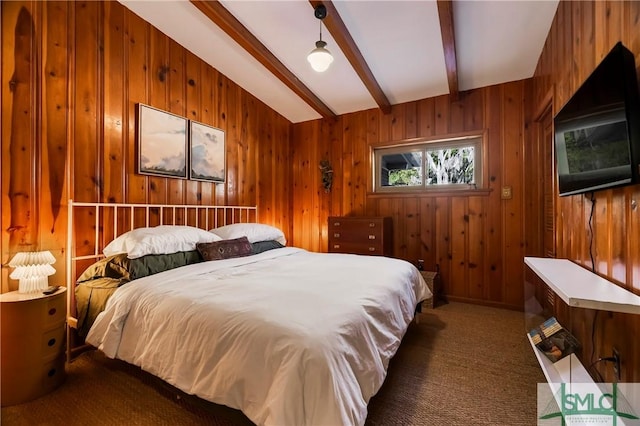 bedroom featuring wood walls, vaulted ceiling with beams, and dark carpet