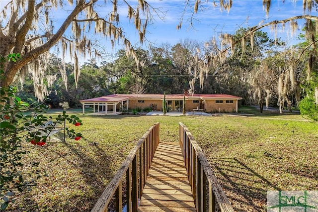 exterior space featuring a yard