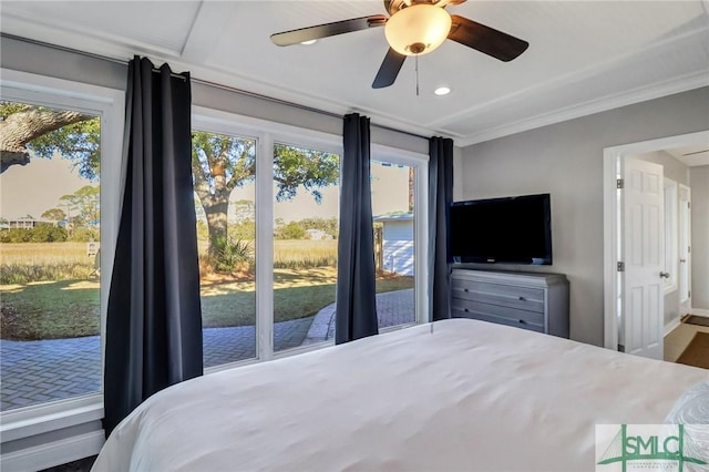 bedroom featuring ceiling fan and access to outside