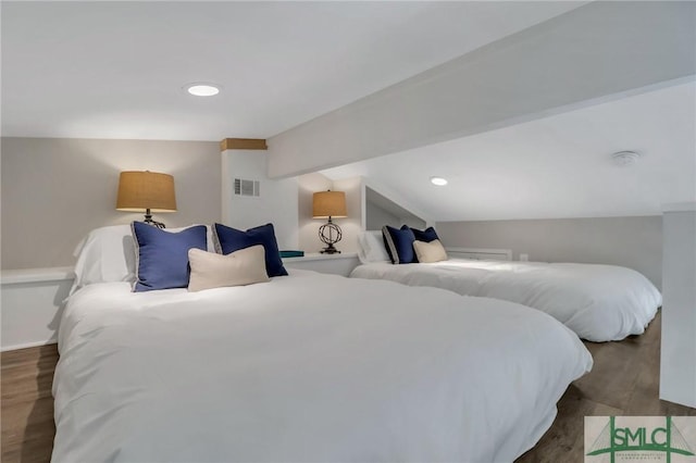 bedroom featuring dark hardwood / wood-style floors